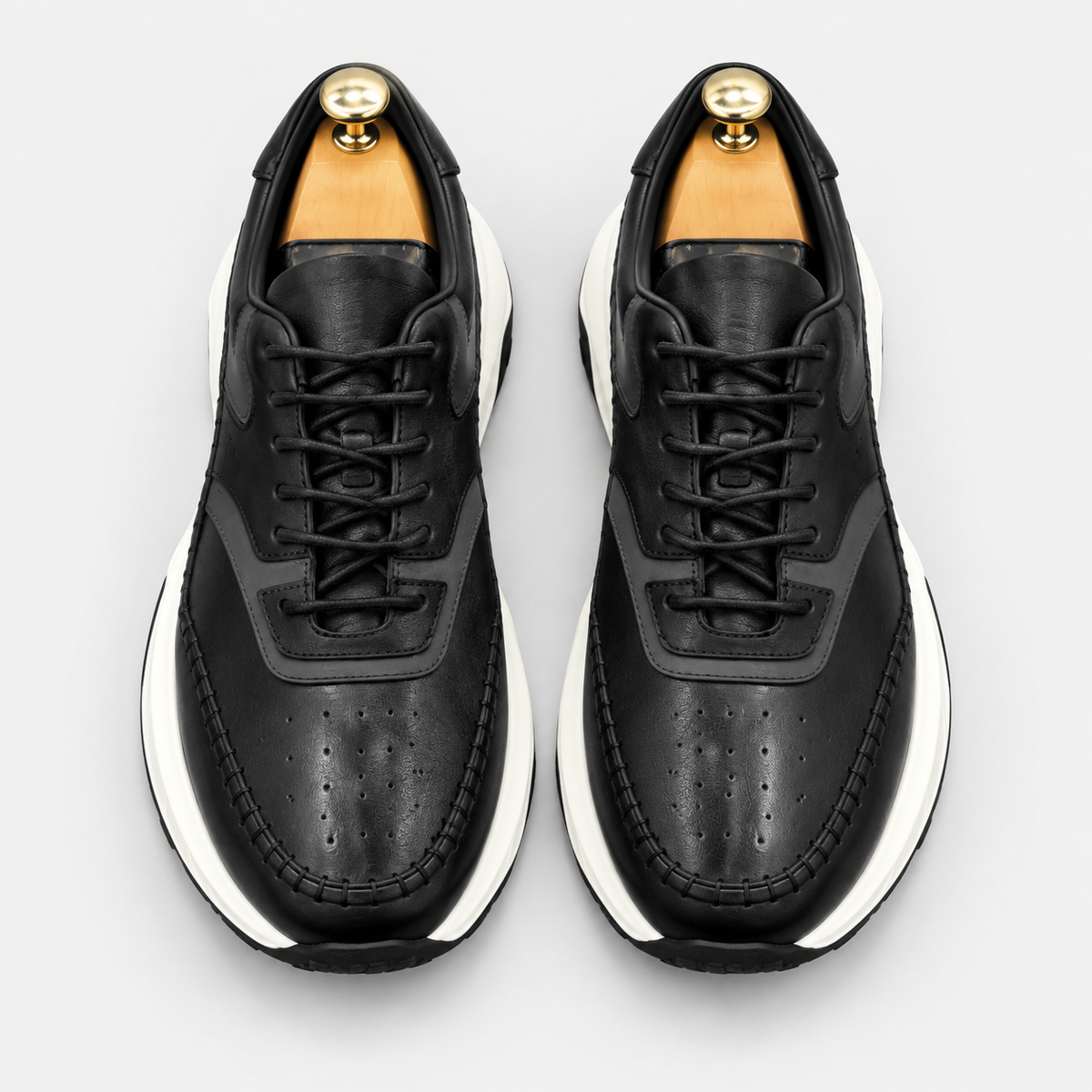 Sneaker cuir noir surpiqué